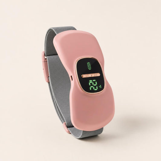 Dusty rose cordless heating belt with grey strap and LED display, three-quarter view