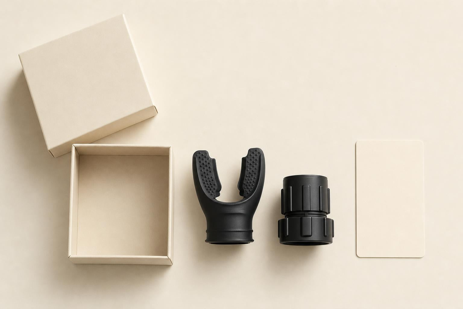 Breath trainer in two parts beside its plain box and card